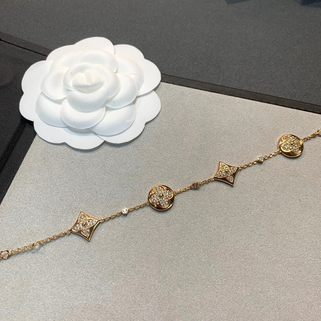 ¡®Lumi¡¯STAR AND SUN 4 MOTIFS GOLD DIAMONDS BRACELET