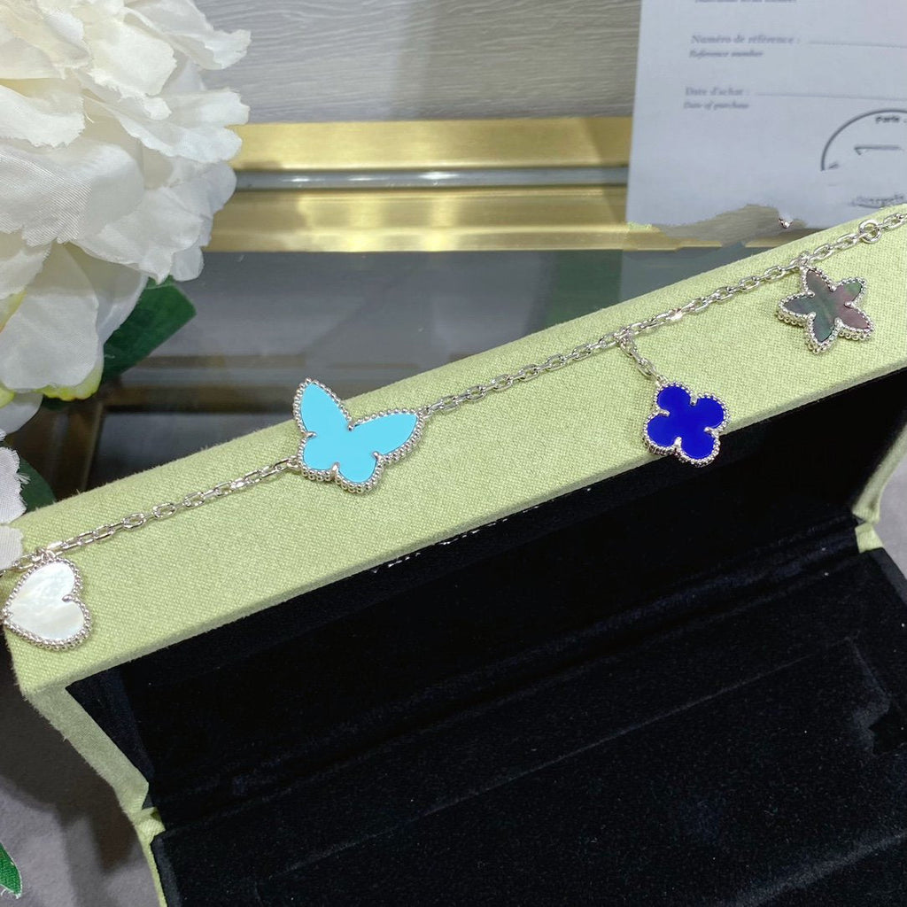 ¡®Lumi¡¯LUCKY SPRING SILVER BRACELET 4 MOTIF