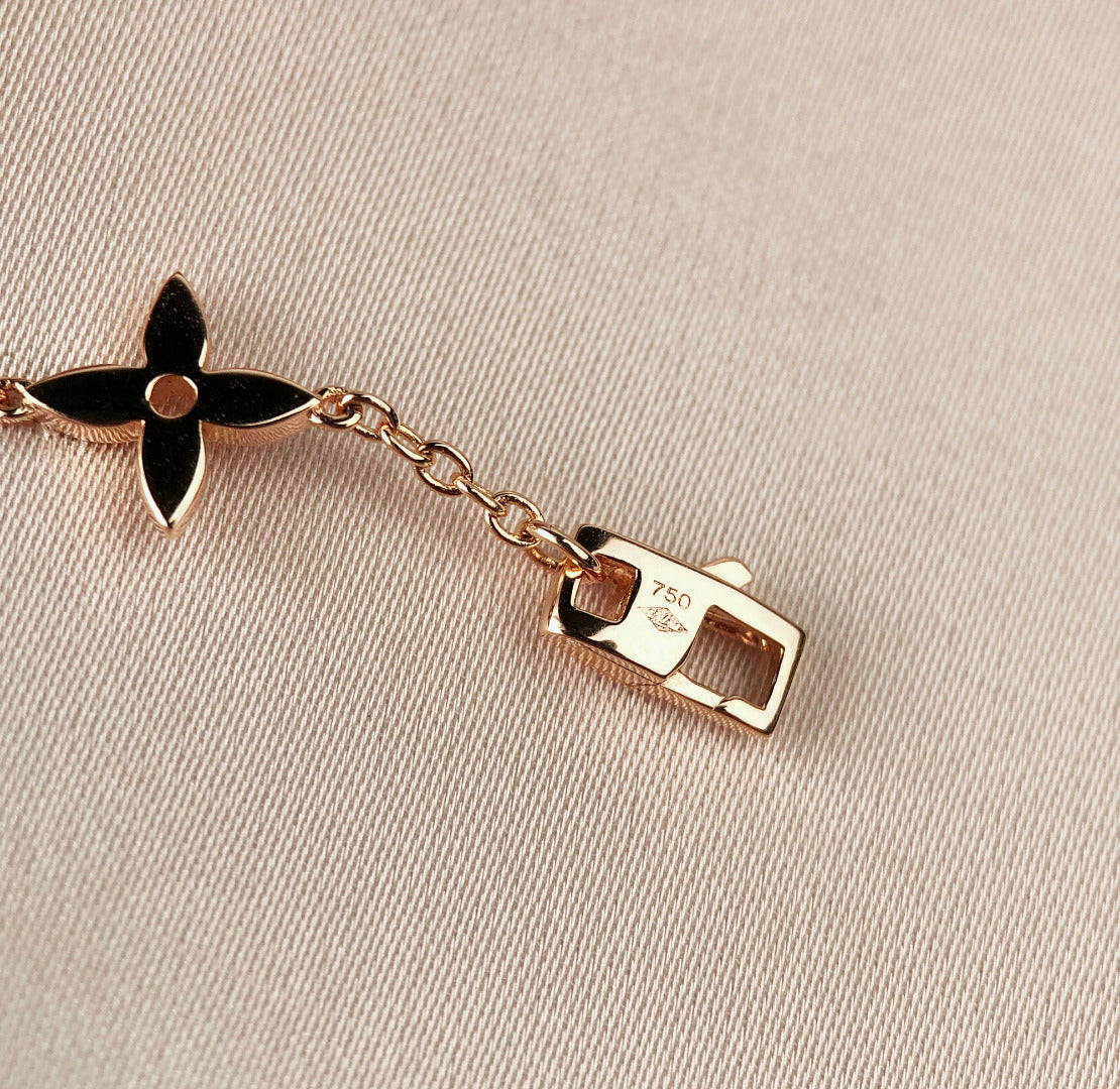 ¡®Lumi¡¯STAR AND SUN 7 MOTIFS GOLD BRACELET