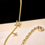 ¡®Lumi¡¯LOGO STAR MOTIF GOLD BRACELET