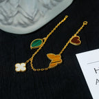 ¡®Lumi¡¯LUCKY SPRING 5 MOTIF GOLD BRACELET