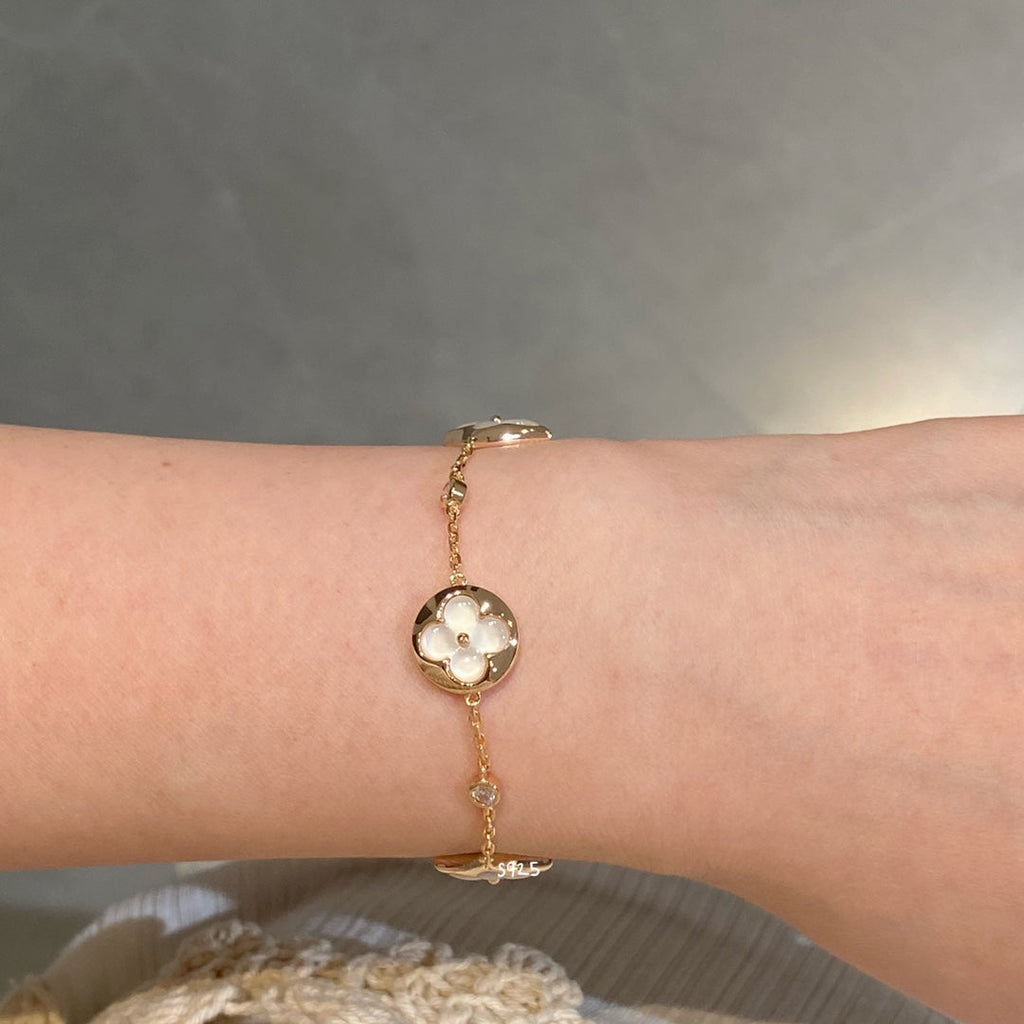 ¡®Lumi¡¯STAR AND SUN 4 MOTIF WHITE MOP PINK GOLD BRACELET