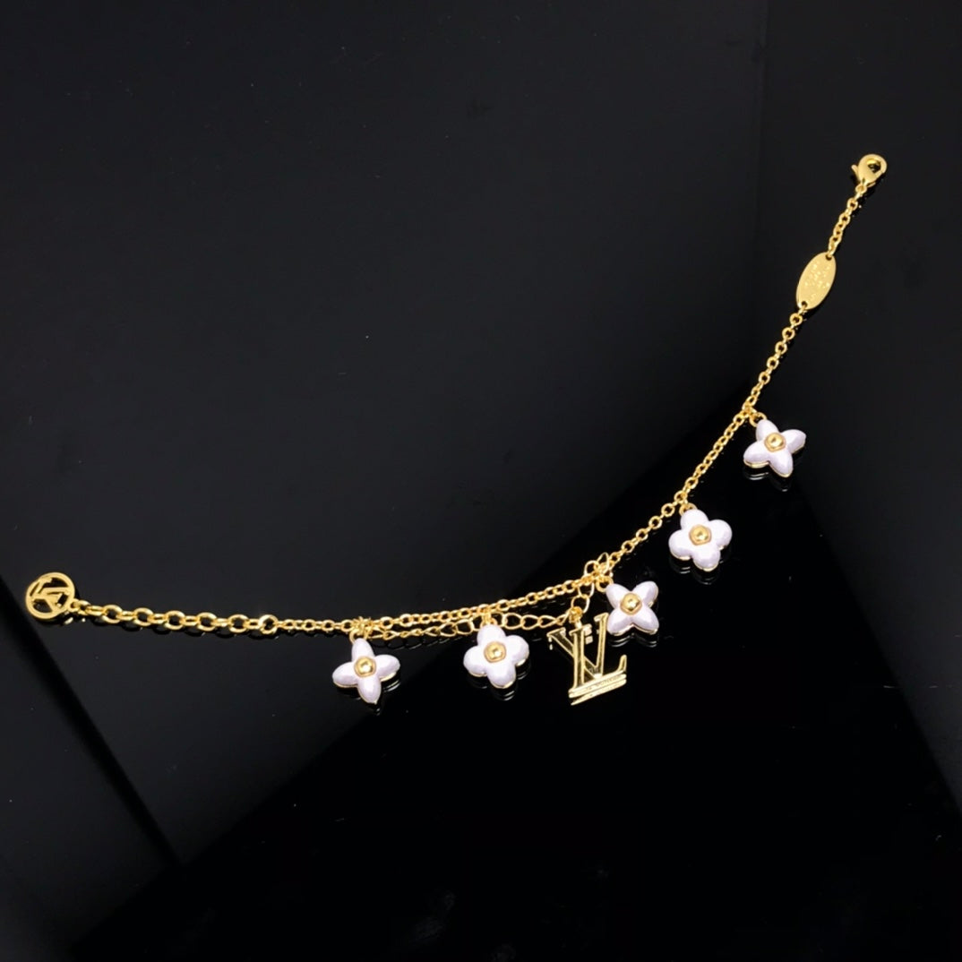 ¡®Lumi¡¯LOGO 6 MOTIF STAR AND SUN GOLD BRACELET